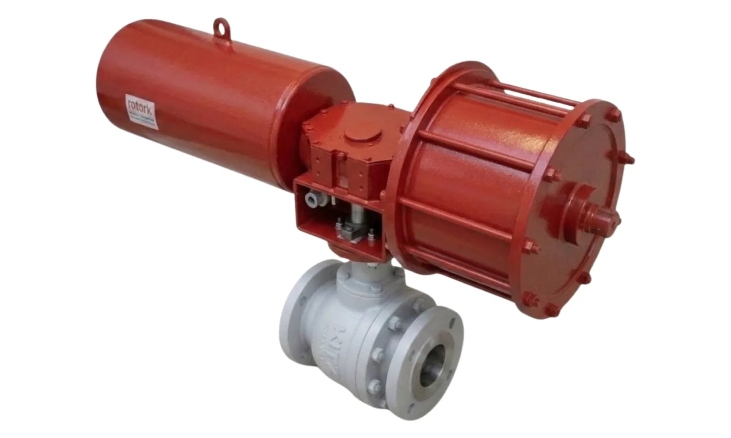 KITZ ball valve with a grey cast body and raised face flanges, under a red Rotork scotch-yoke pneumatic actuator with its spring cylinder, on a white background