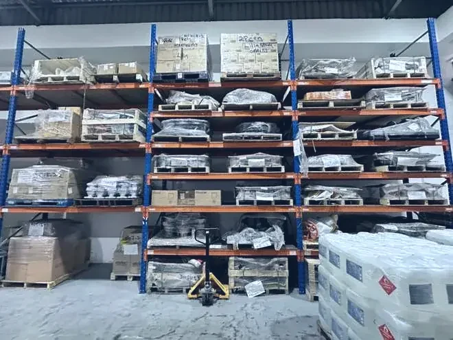 Shelved valve stock, wrapped and palletised, staged for checking before dispatch